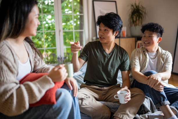 istock Three friends talking in the bedroom 1567381609