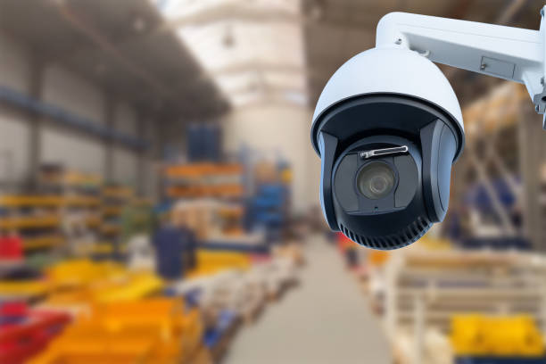 istock CCTV Camera or surveillance operating inside industrial factory. Copy space. 1567389594