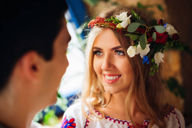 istock Bride's eyes sparkle while she looks at a groom with love 1567420812