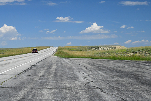 Rock Springs, Wyoming USA- July 19, 2023  There are few vehicles on this remote stretch of highway in Wyoming. This shot was taken on a road trip between Rock Springs and Pinedale Wyoming.