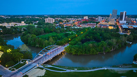 Image of Martin Luther King Bridge leading to Headwaters Park and downtown Fort Wayne night lights aerial