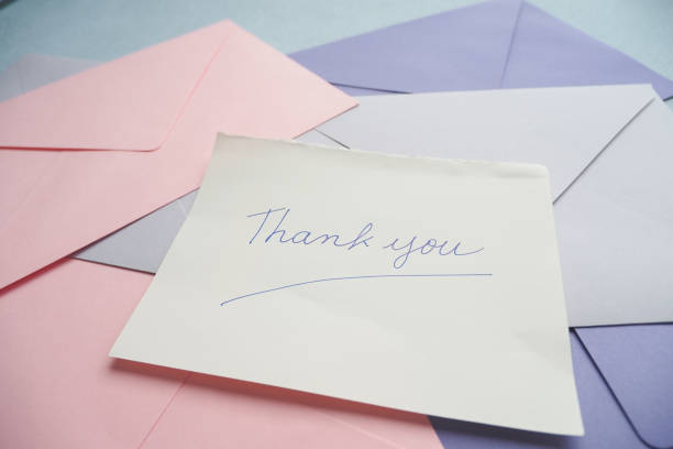 istock thank you message and envelope on wooden table 1567454781
