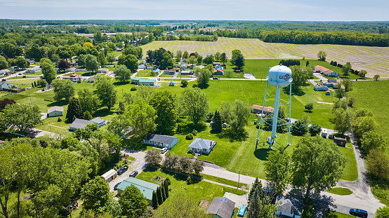 Image of Rural houses, farms, farmland, aerial Pierceton Indiana water tower