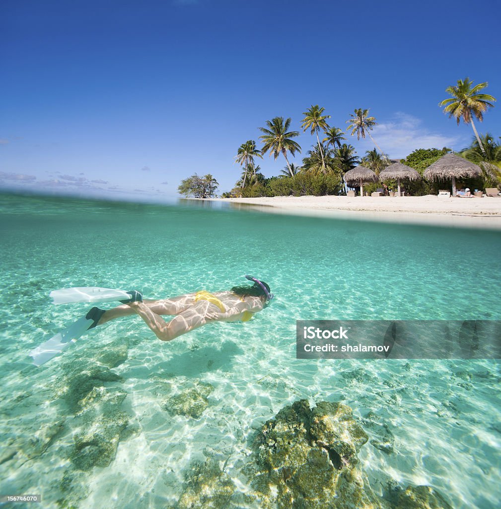 Donna nuoto Subacqueo - Foto stock royalty-free di Tahiti