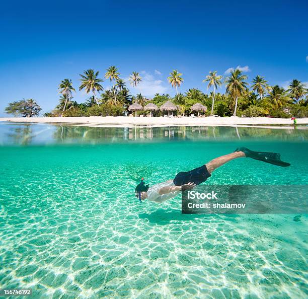 Man Swimming Underwater Stock Photo - Download Image Now - Maldives, Snorkeling, Snorkel