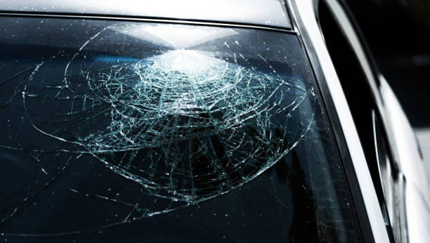 istock Broken car windshield glass on a car 1567474791