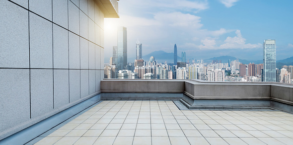 Empty platform against shenzhen city skyline, China