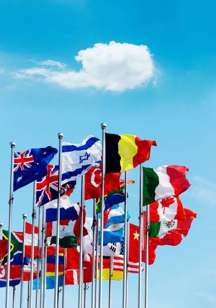 istock Set of flags fluttering in the wind against blue sky background 1567486095