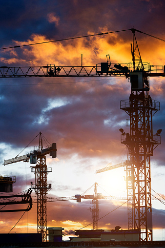 Group of cranes on construction site in China