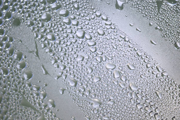 istock water drops delicately clinging to a glass surface 1567490092