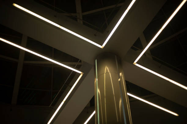 istock Pillar in interior. Ceiling with lamps. Modern interior design. 1567495592