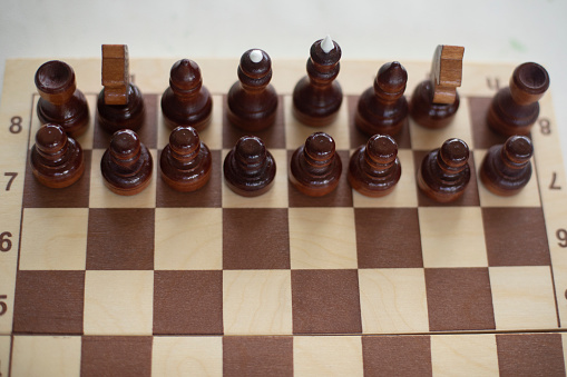 Chess board and stopwatch.