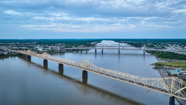 istock White gold truss bridge stretching across large river Ohio River aerial 1567496156