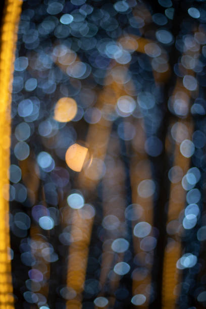 istock Unfocused background lights. Garlands in blurred form. Festive texture. 1567496689
