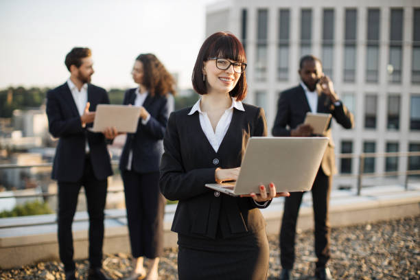 istock Diverse agents having business meeting on panoramic terrace 1567508810