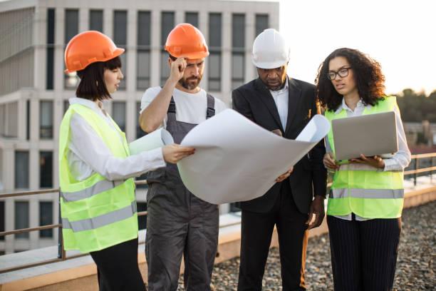 istock Industrial employees working on remodeling business center 1567509376