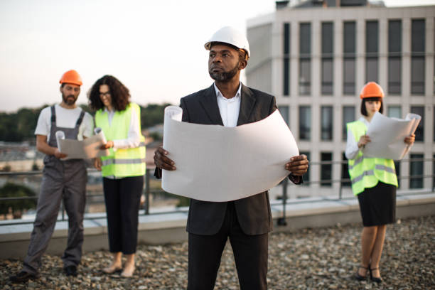 istock Diverse architects meeting in open air for plan discussion 1567509961