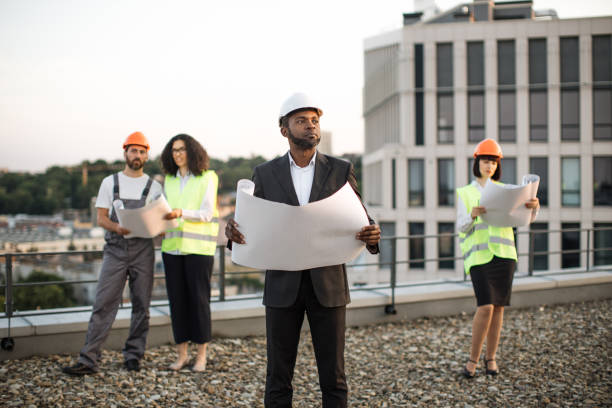 istock Diverse architects meeting in open air for plan discussion 1567509962