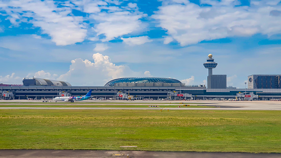 Changi, Singapore - ‎June 13, 2023 : Panoramic View Of Runway And Terminal Of Changi Airport In Singapore. Changi Airport Is One Of The Busiest Passenger Hubs For South East Asia.