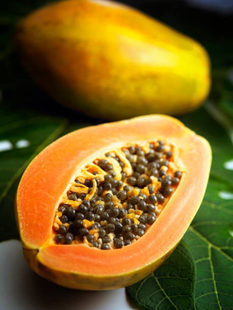 istock half of ripe papaya fruit with seeds 1567514967
