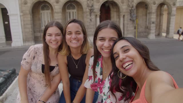 Point of view of group of friends taking a selfie in Havana, Cuba