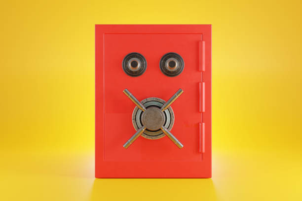 Red security safe with retro style dial combination and vault handle on yellow background. Illustration of the concept of asset protection and home security