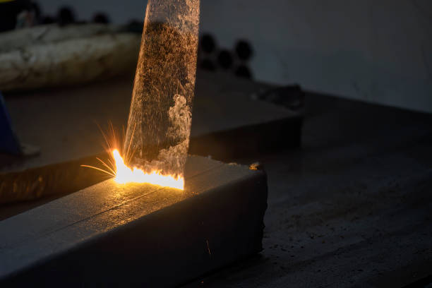 istock High technology dust removal the steel square pipe cleaning process by laser. 1567532320