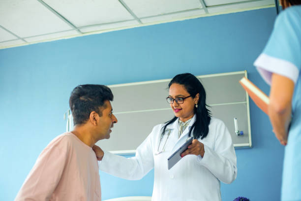 istock Doctor counseling her patient suffering from illness 1567534441