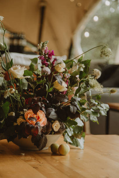 istock wedding decoration, setting table with pants and flowers 1567551029