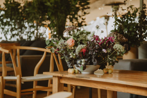 istock wedding decoration, setting table with pants and flowers 1567553748