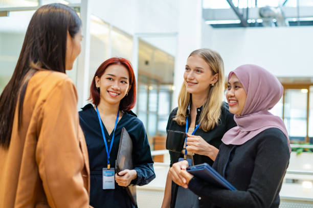 Group of business people having casual conversation