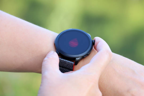 istock Smart watch on female hand measuring blood oxygen level 1567554835