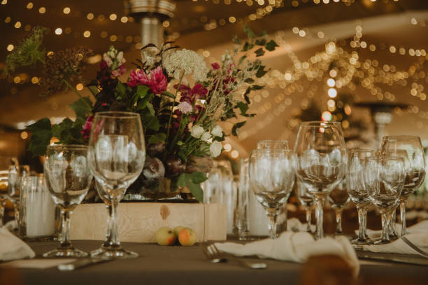 istock wedding decoration, setting table with pants and flowers 1567557550