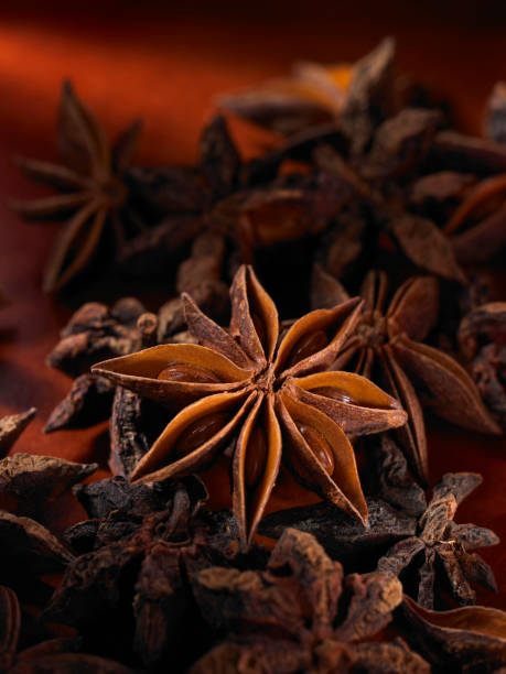 istock Abstract aniseed aromatic background. Anise stars condiment close up 1567558111