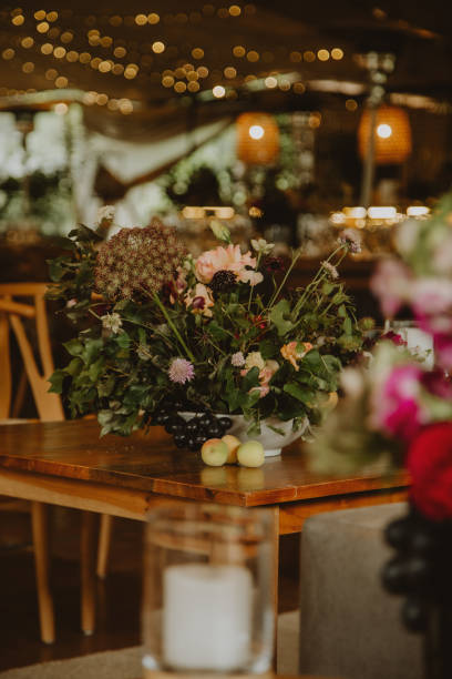 istock wedding decoration, setting table with pants and flowers 1567560887