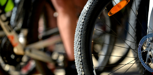 Bicycle front tire , outdoor image on sunny day