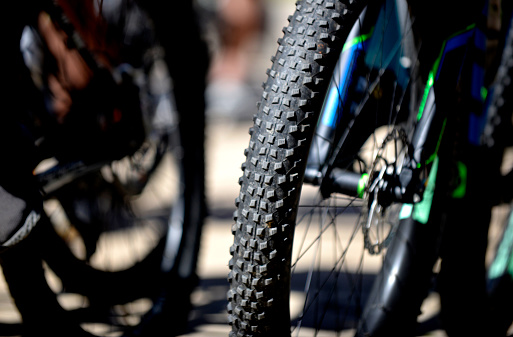 Bicycle front tire , outdoor image on sunny day