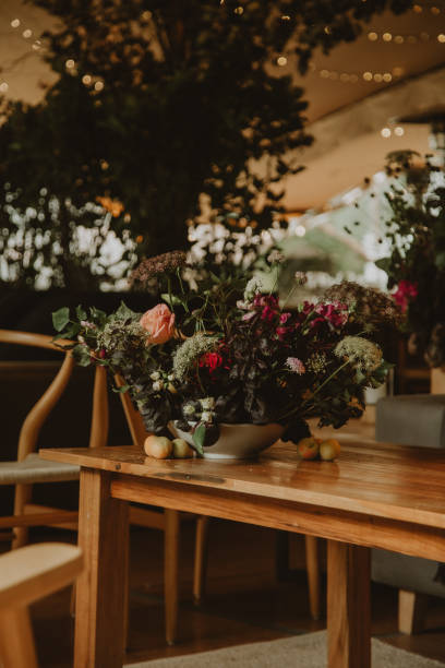 istock wedding decoration, setting table with pants and flowers 1567565278