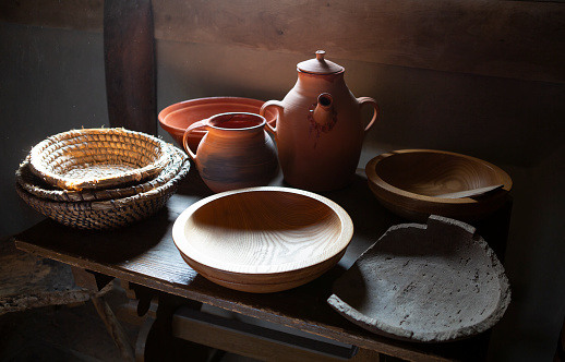 Tabletop with wooden handcrafted old kitchenware