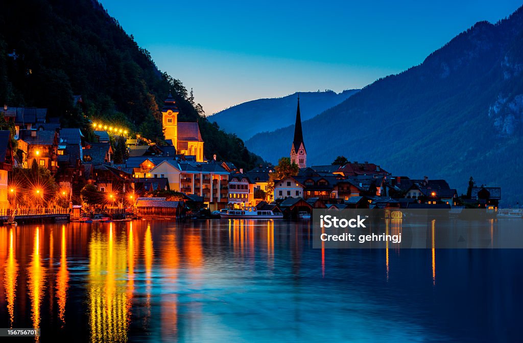 Hallstatt by night Lakeside village of Hallstatt by night, Upper Austria, Austria. Hallstatt is famous place of Austrian Alps in the region of Salzkammergut in Upper Austria. Hallstatt Stock Photo