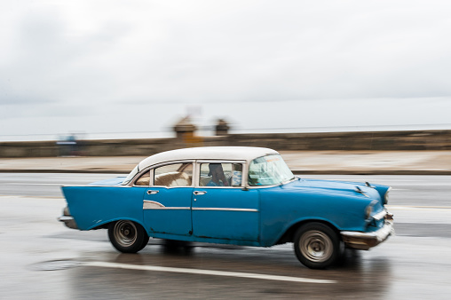 HAVANA, CUBA - OCTOBER 21, 2017: Old Car in Havana, Cuba. Pannnig. Retro Vehicle Usually Using As A Taxi For Local People and Tourist. Blue Color