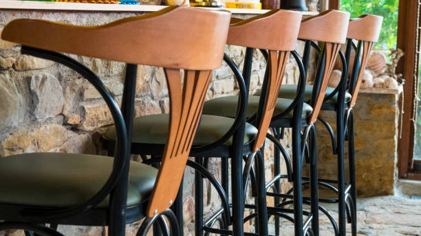 Restaurant bar with chairs lined up waiting for customers for summer parties in Aegean island