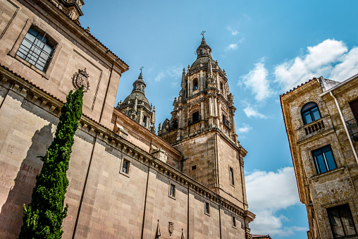 Side Low Angle View Of Clerecia Church In Salamanca, Spain