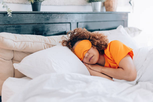 istock young woman sleeping comfortable in hotel bedroom 1567656265