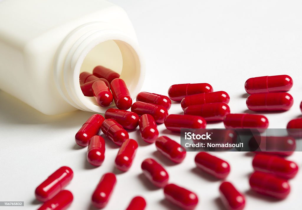 Rovesciare pillole - Foto stock royalty-free di Antibiotico