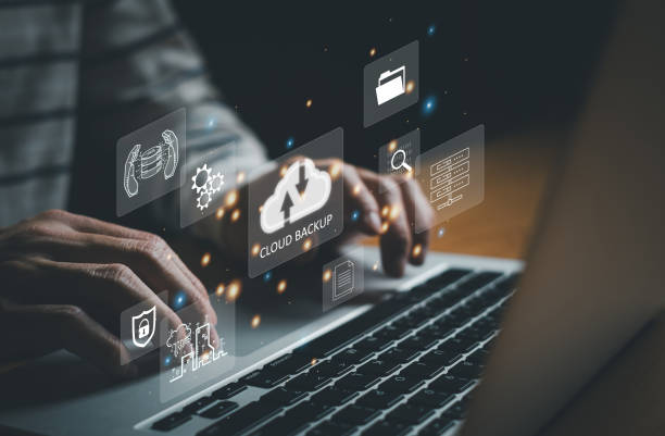 istock Business person migrate data and corporate information into cloud technology for data security and back up as disaster recovery site and prevent for cyber crime. Data inventory for enterprise. 1567666942