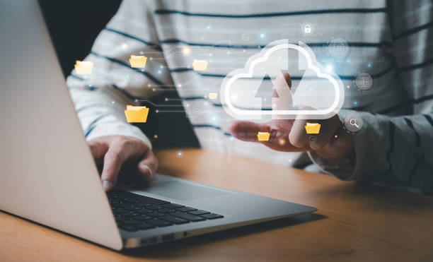istock Business person migrate data and corporate information into cloud technology for data security and back up as disaster recovery site and prevent for cyber crime. Data inventory for enterprise. 1567671173