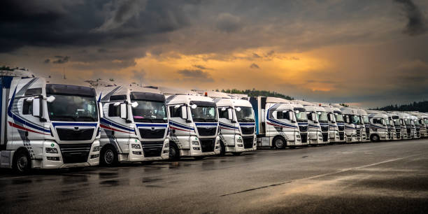 istock Trucks in a row on a parking 1567674488