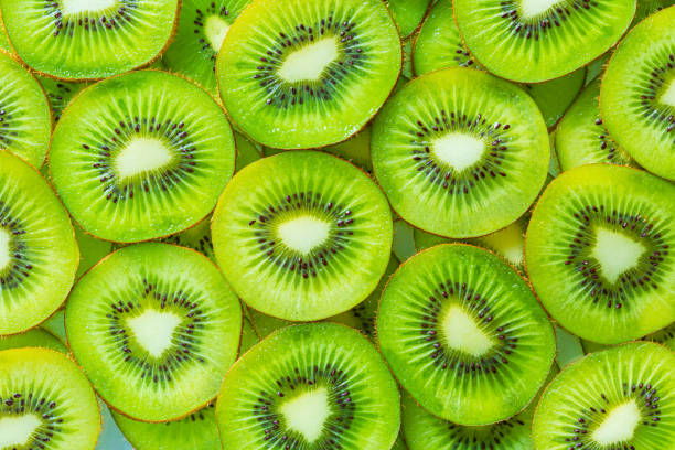 istock macro kiwi,macro kiwi background,Kiwi Macro,Fresh Kiwi fruit sliced use for background,slice of kiwi fruit on a full frame. horizontal format 1567676150