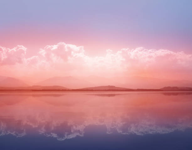 istock Sunset waterscape of lake with sky reflection 1567681037